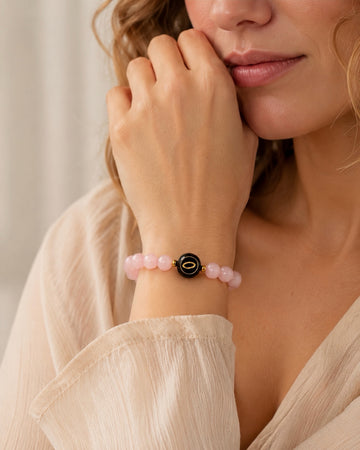 pink Madagascar rose quartz NFC crystal bracelet, Flora Halo by Void Halo, worn on wrist