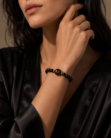 black obsidian NFC crystal bracelet, Jet Halo by Void Halo, worn on wrist