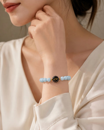 sea blue aquamarine NFC crystal bracelet, Ocean Halo by Void Halo, worn on wrist