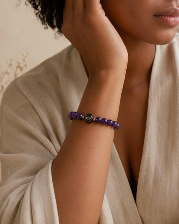 deep plum purple Uruguayan amethyst NFC crystal bracelet, Plum Halo by Void Halo, worn on wrist