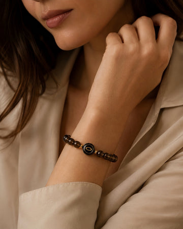 dark smoky quartz NFC crystal bracelet, Mocha Halo by Void Halo, worn on wrist